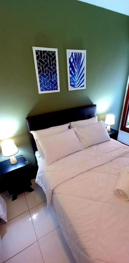 Bliss Hoteis Centro Armacao dos Buzios Exterior photo A bed with two pillows
