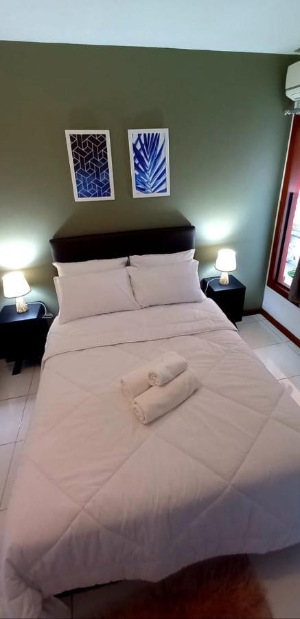 Bliss Hoteis Centro Armacao dos Buzios Exterior photo A bed with a duvet