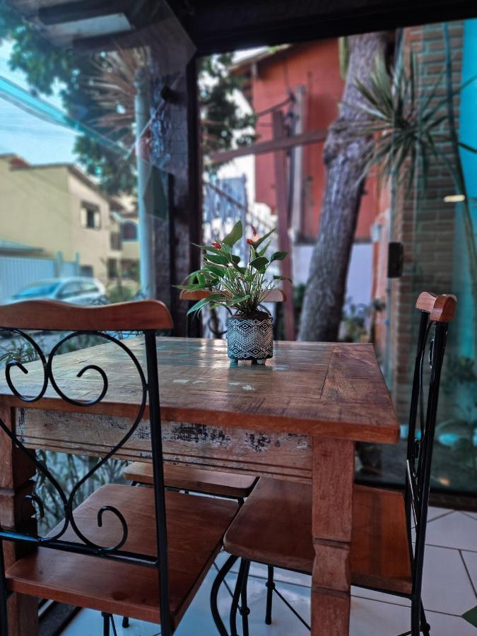 Bliss Hoteis Centro Armacao dos Buzios Exterior photo A table and chair